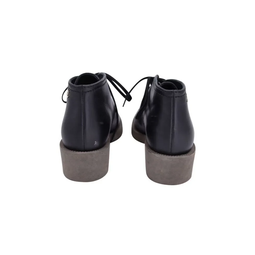 Reposhing - CHANEL Black Ankle Boots with Gold Accents - Picture 3 of 8